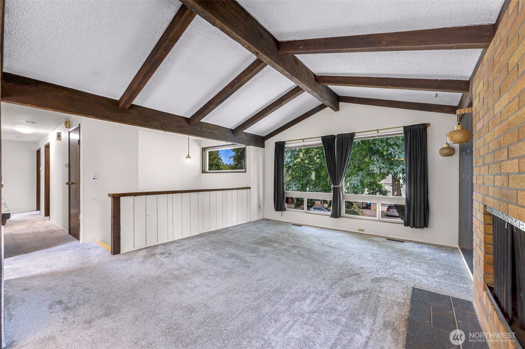 5925 Longdin Road Ferndale, WA 98248 - Photo 8 of 28 a view of an empty room with a fireplace and a window