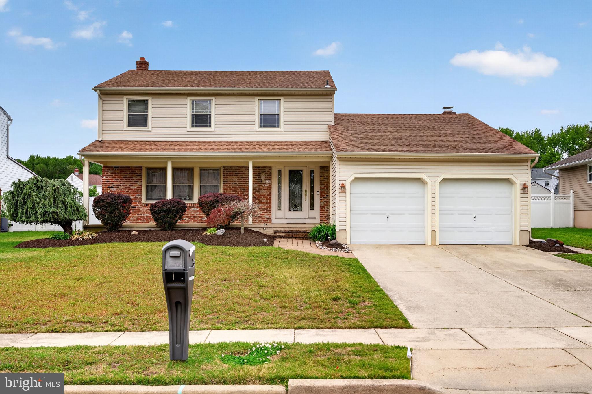 24 Millbridge Road Clementon, NJ 08021 - Photo 1 of 46 a front view of house with yard and outdoor seating