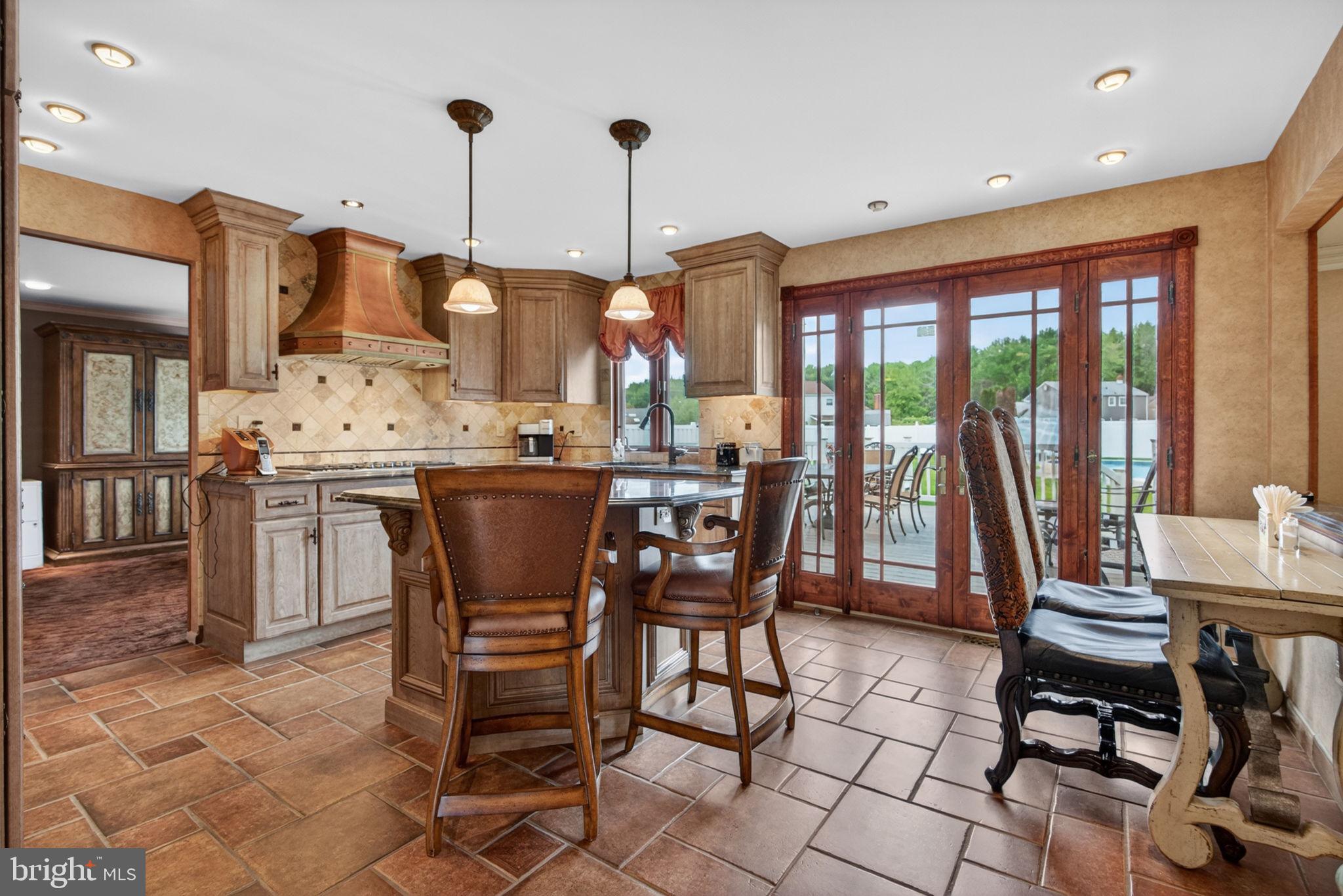 24 Millbridge Road Clementon, NJ 08021 - Photo 13 of 46 a view of a dining room with furniture window and outside view
