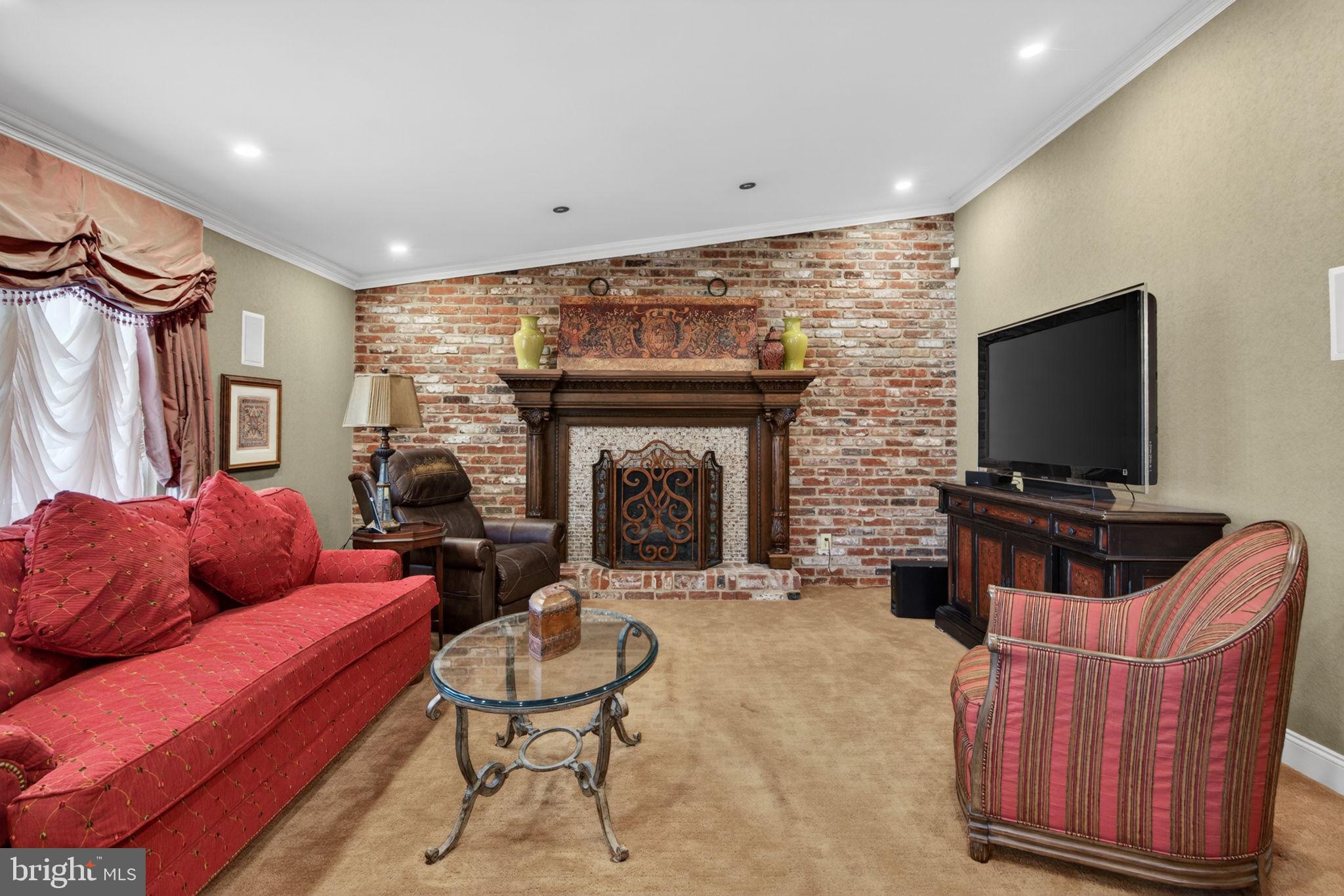 24 Millbridge Road Clementon, NJ 08021 - Photo 17 of 46 a living room with furniture and a flat screen tv