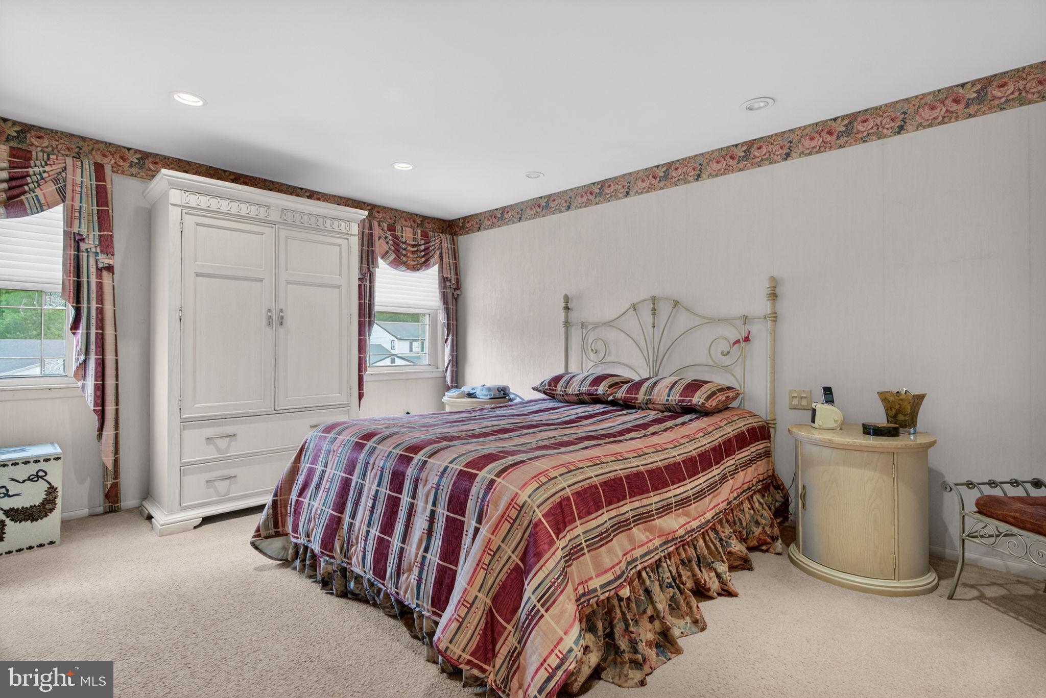 24 Millbridge Road Clementon, NJ 08021 - Photo 22 of 46 a bedroom with a bed and a window