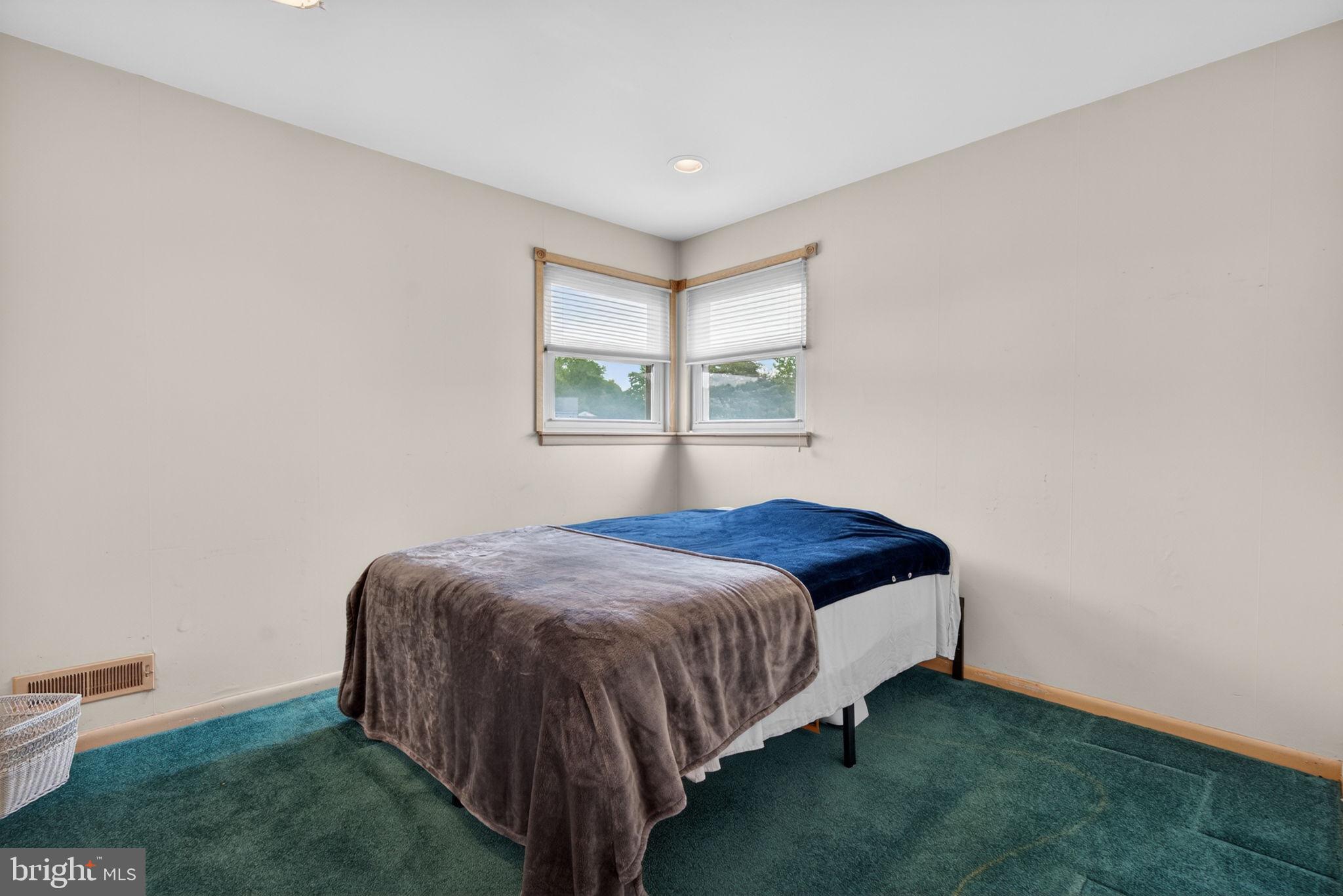 24 Millbridge Road Clementon, NJ 08021 - Photo 25 of 46 a bedroom with a bed and a window