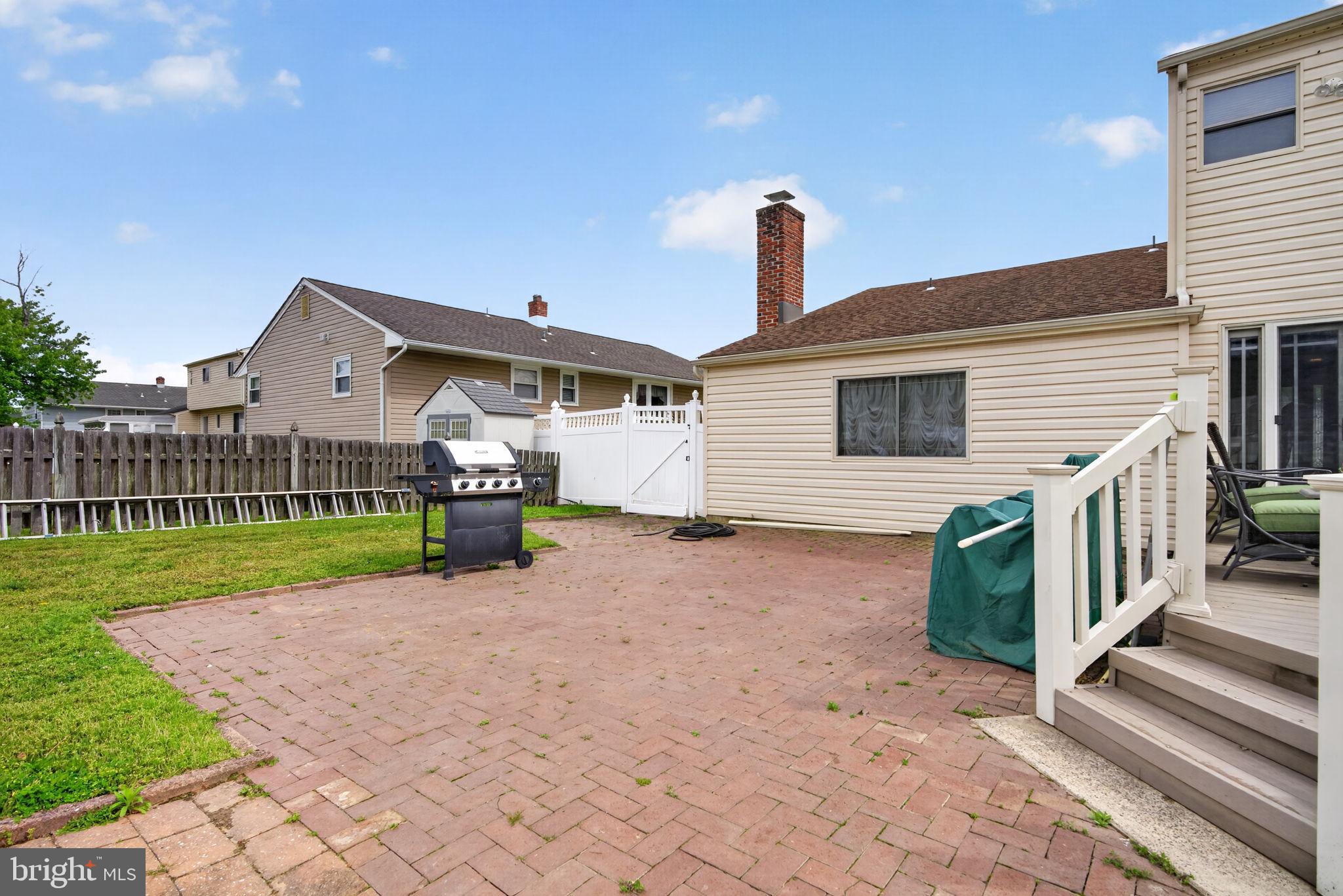 24 Millbridge Road Clementon, NJ 08021 - Photo 34 of 46 a view of a house with a yard and fence