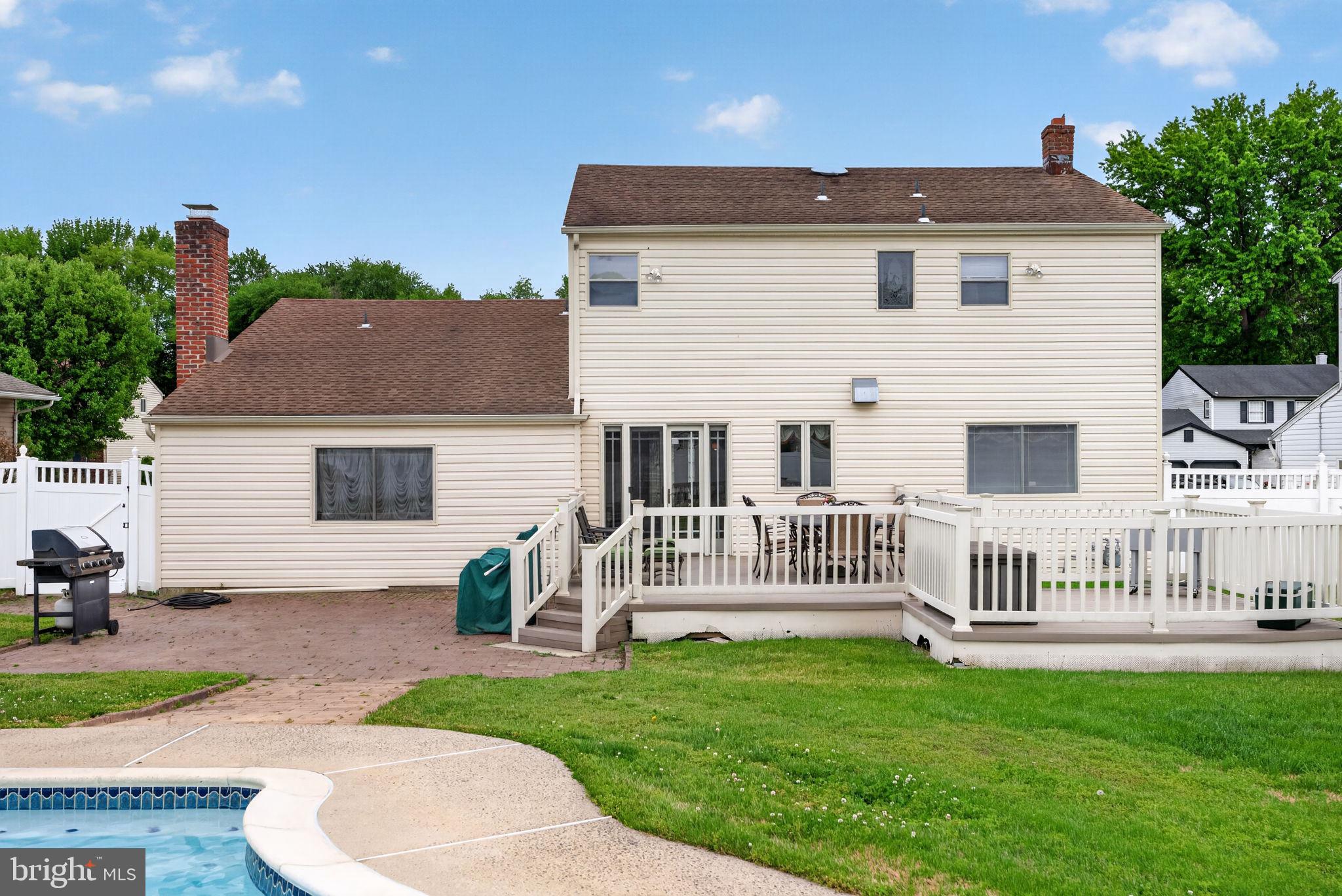 24 Millbridge Road Clementon, NJ 08021 - Photo 35 of 46 a view of a house with a yard and a garden
