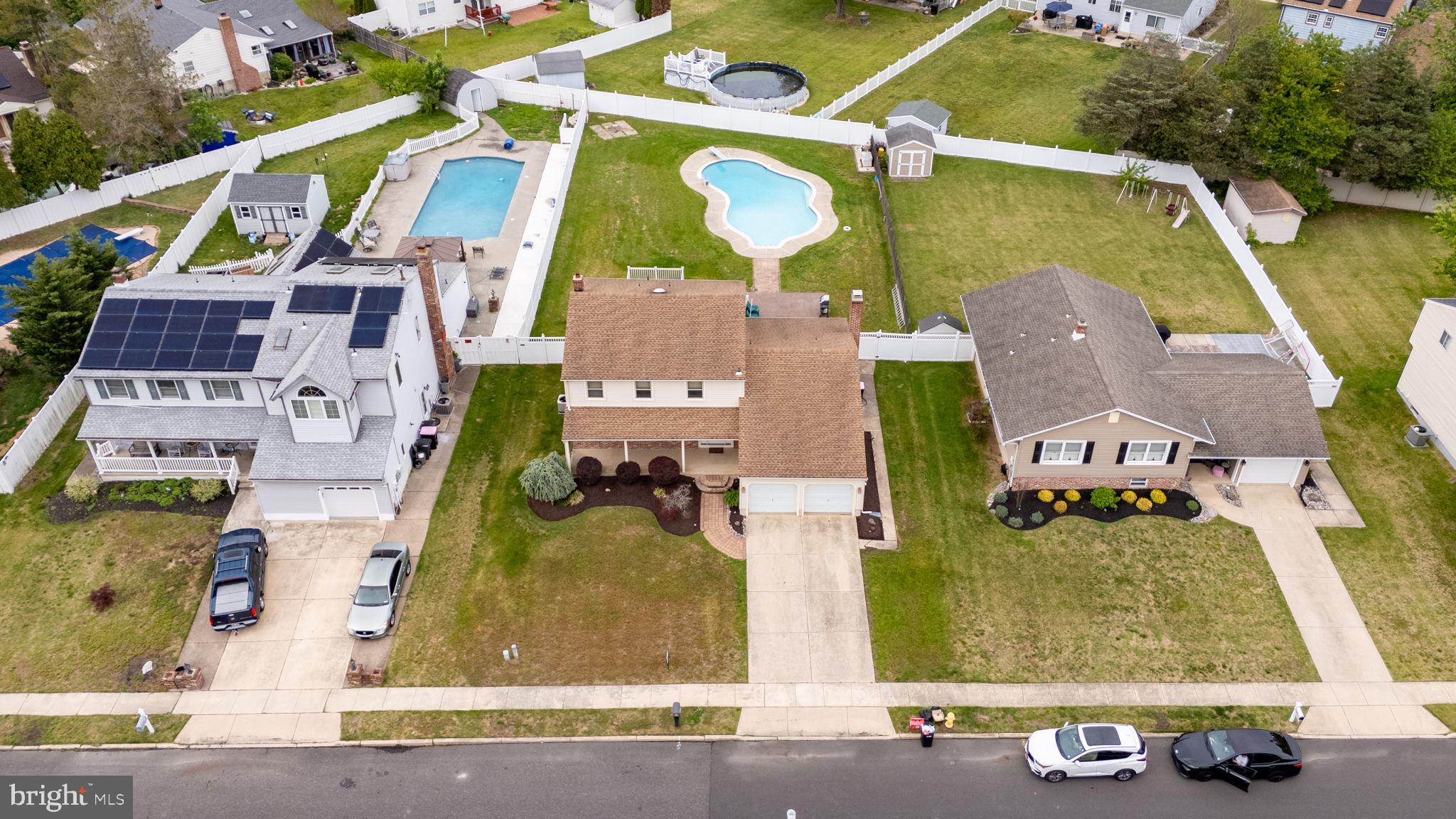 24 Millbridge Road Clementon, NJ 08021 - Photo 41 of 46 an aerial view of residential houses with outdoor space and parking