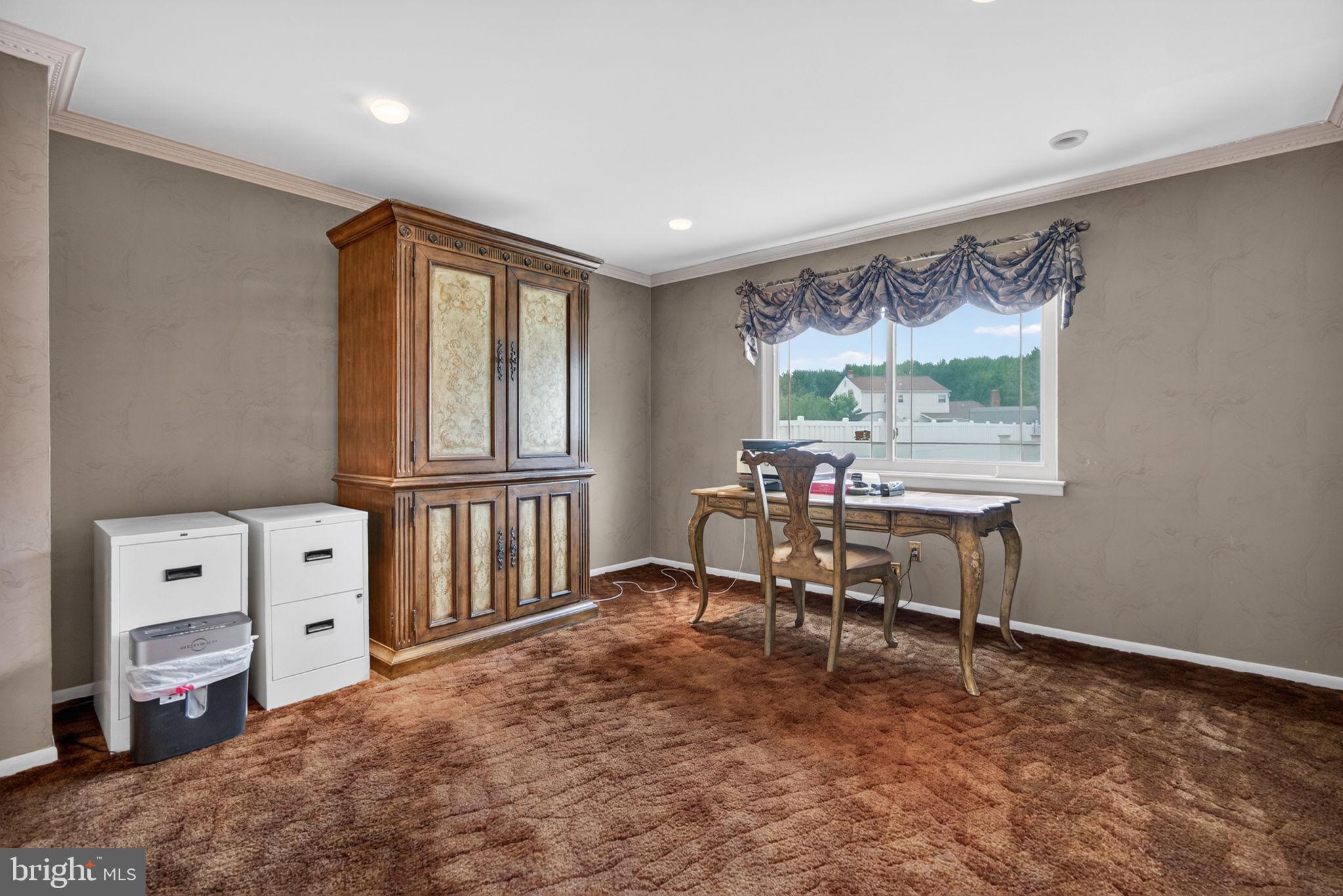 24 Millbridge Road Clementon, NJ 08021 - Photo 10 of 46 a view of a workspace with furniture and a window