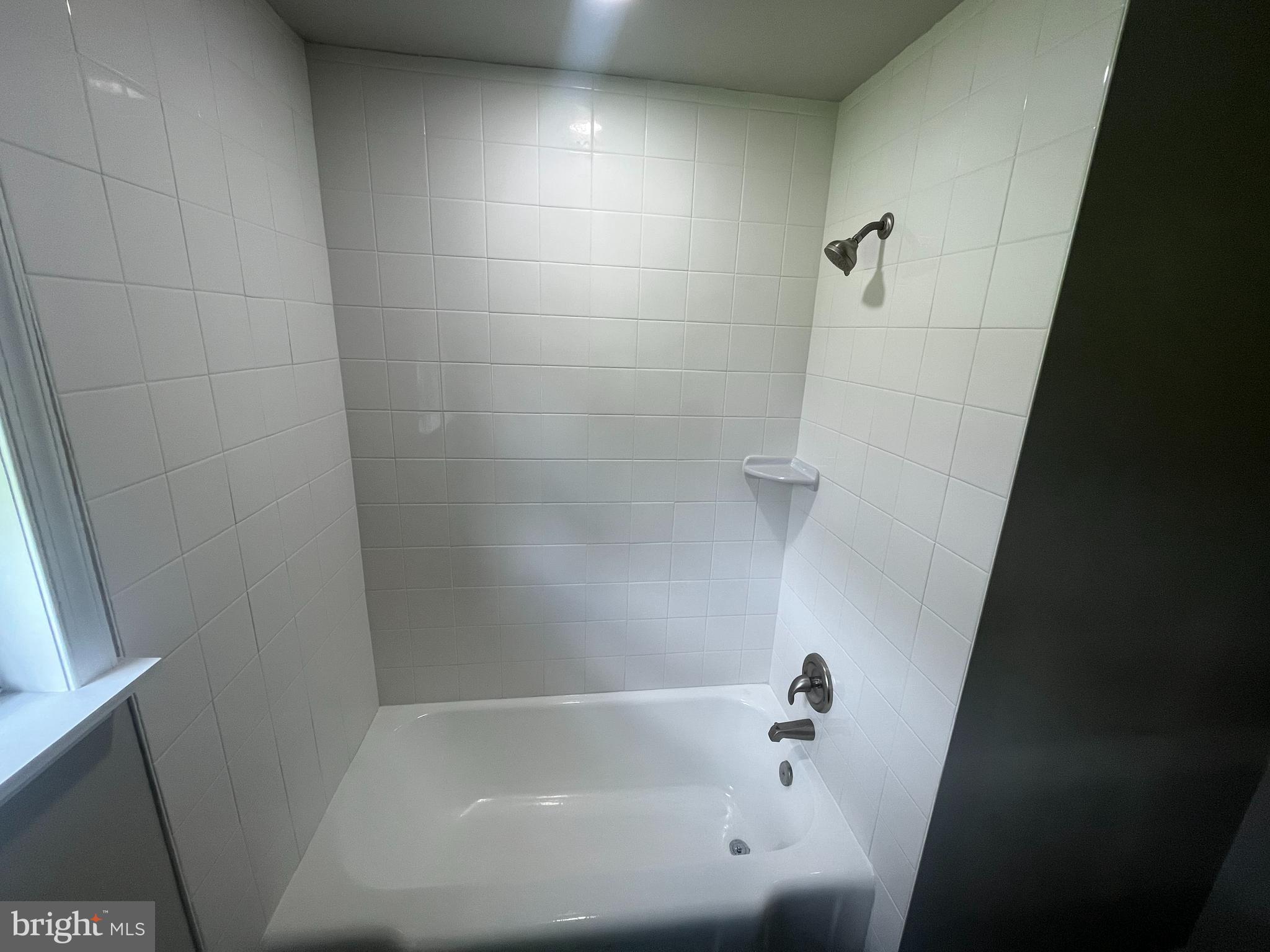 21305 Haven Road Rock Hall, MD 21661 - Photo 21 of 52 a bathroom with a bathtub
