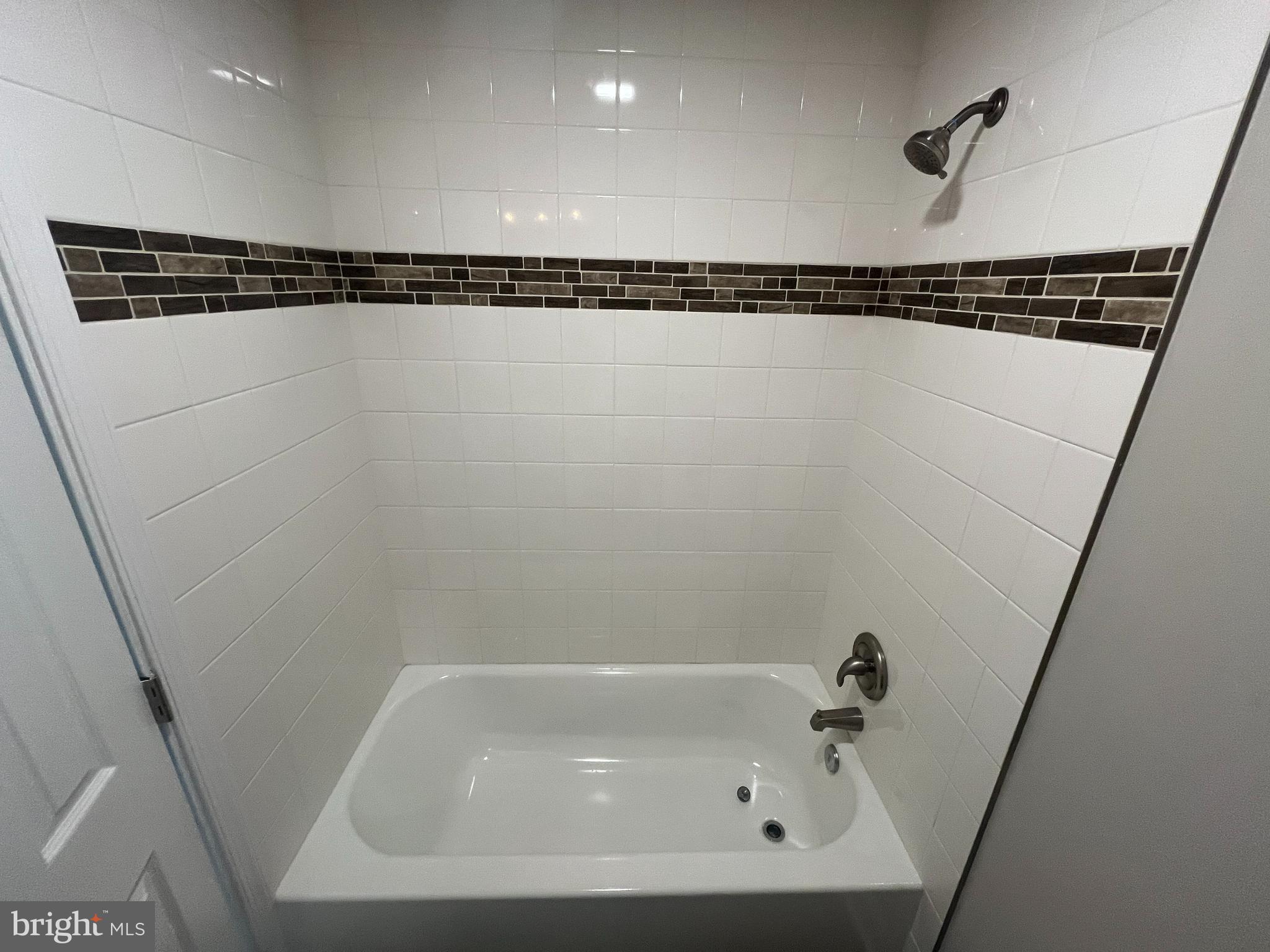 21305 Haven Road Rock Hall, MD 21661 - Photo 22 of 52 a bathroom with a bathtub