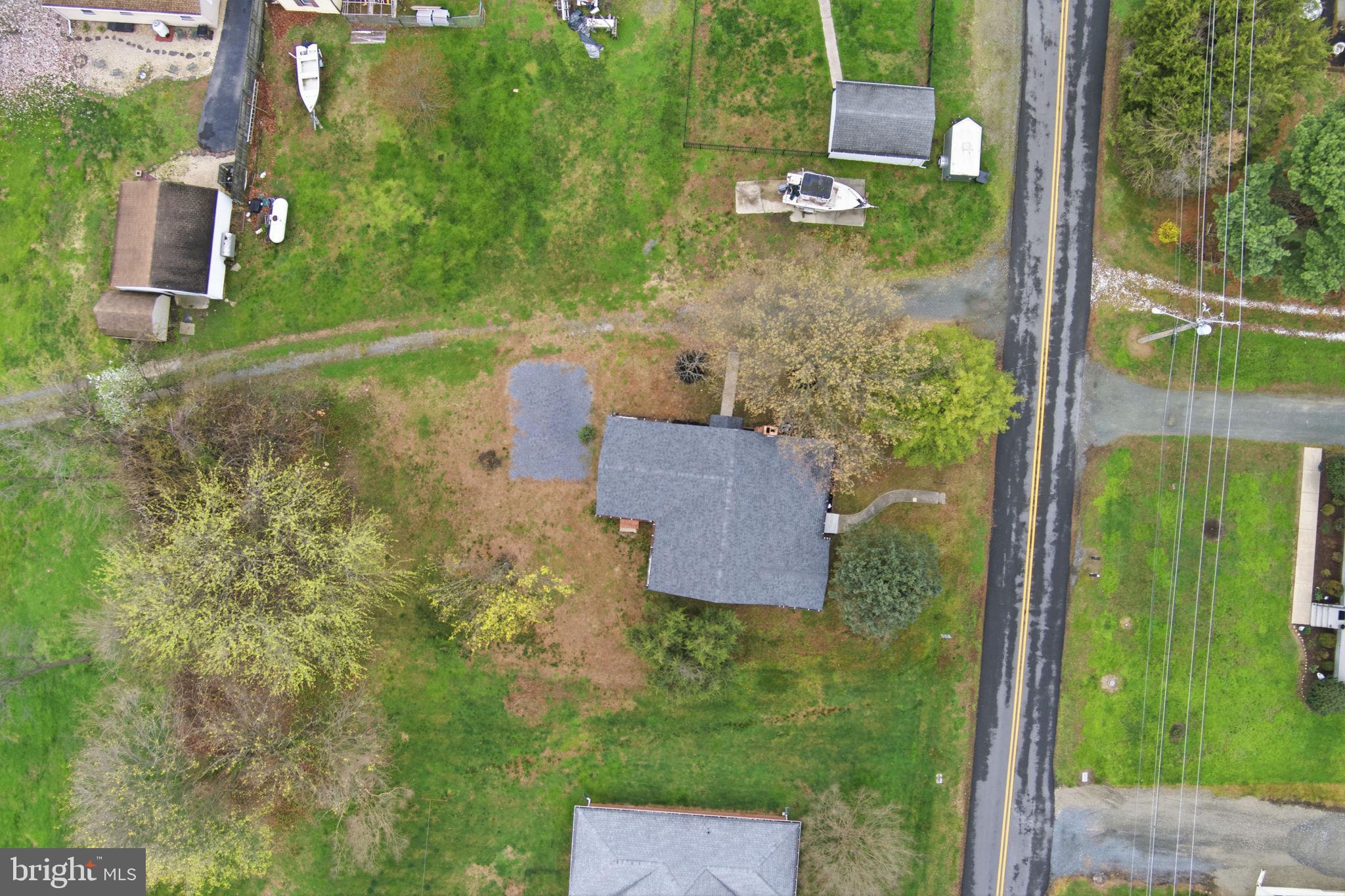 21305 Haven Road Rock Hall, MD 21661 - Photo 32 of 52 an aerial view of residential house with outdoor space