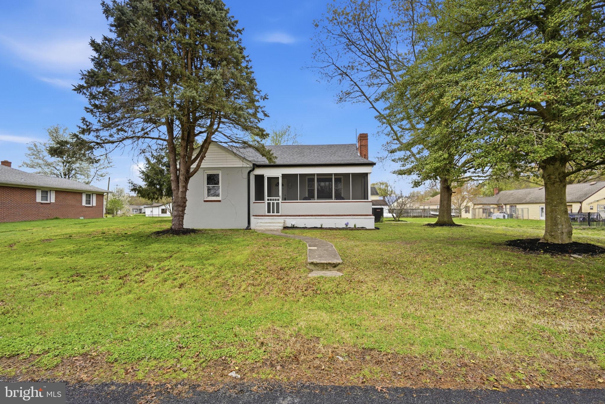 21305 Haven Road Rock Hall, MD 21661 - Photo 41 of 52 a view of a house with a yard