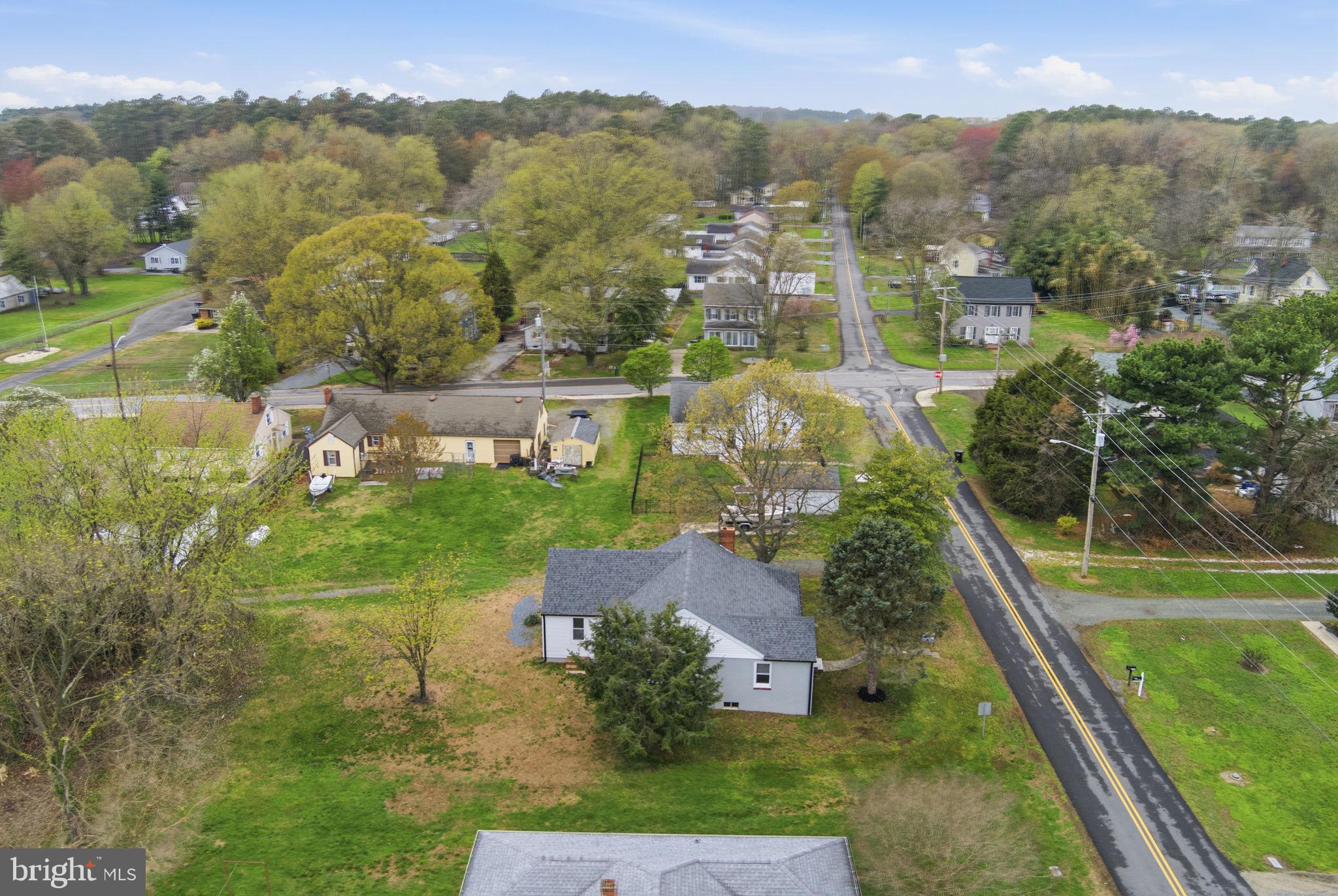21305 Haven Road Rock Hall, MD 21661 - Photo 43 of 52 an aerial view of residential houses with outdoor space and trees