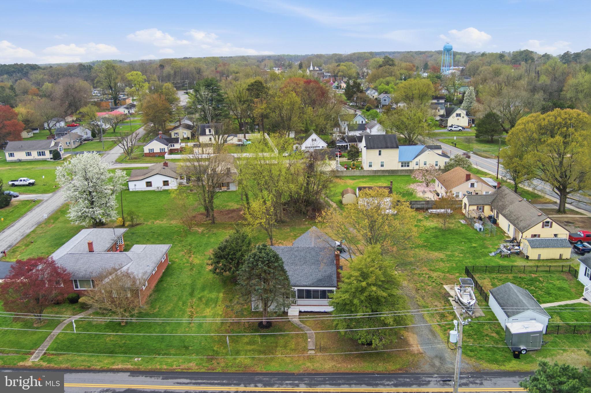 21305 Haven Road Rock Hall, MD 21661 - Photo 44 of 52 an aerial view of residential houses with outdoor space and lake view