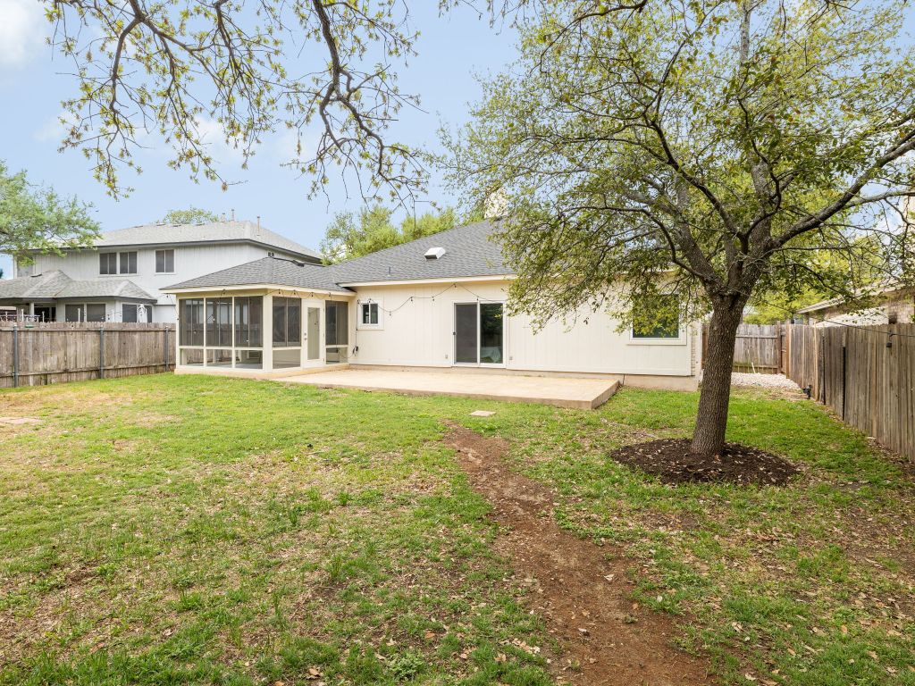 8004 Osborne Drive Austin, TX 78729 - Photo 18 of 24 a house view with a garden space