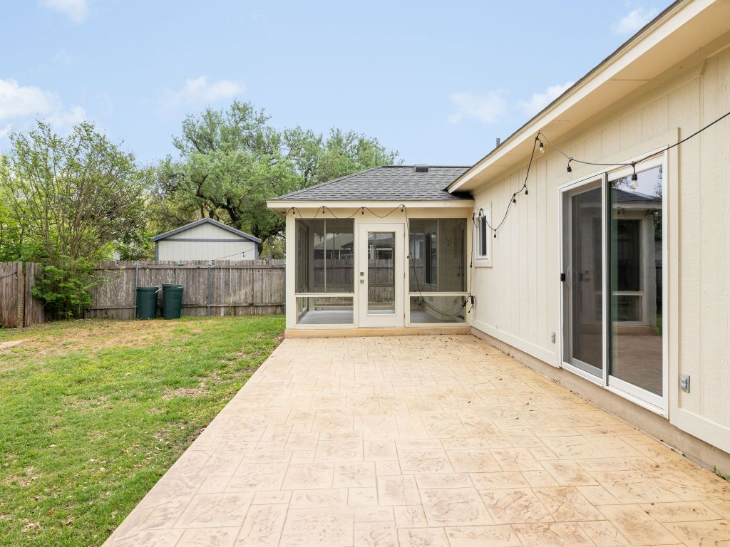 8004 Osborne Drive Austin, TX 78729 - Photo 21 of 24 a view of a house with backyard and garden