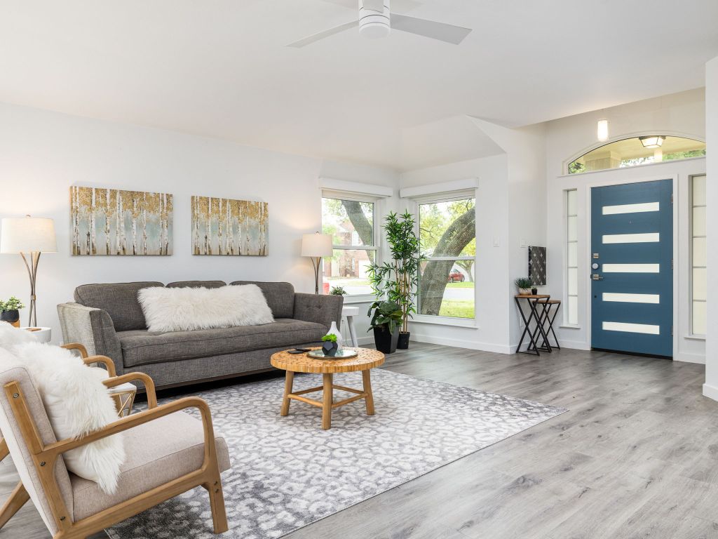 8004 Osborne Drive Austin, TX 78729 - Photo 7 of 24 a living room with furniture and a window