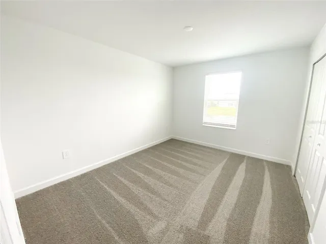 a view of a backyard of a house