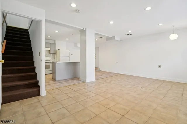 a view of a kitchen with a sink