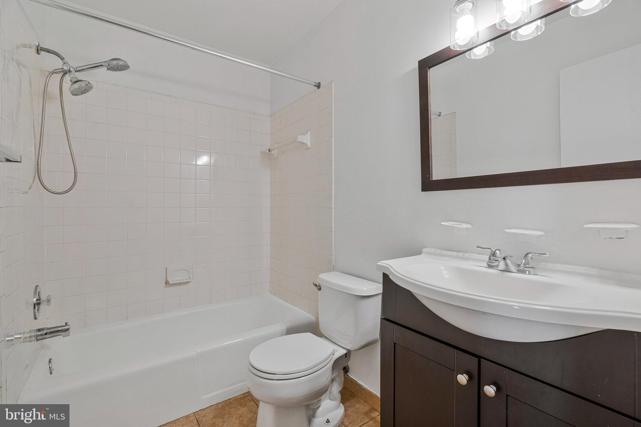 2131 Ferguson Place Herndon, VA 20170 - Photo 12 of 27 a bathroom with a sink toilet and shower