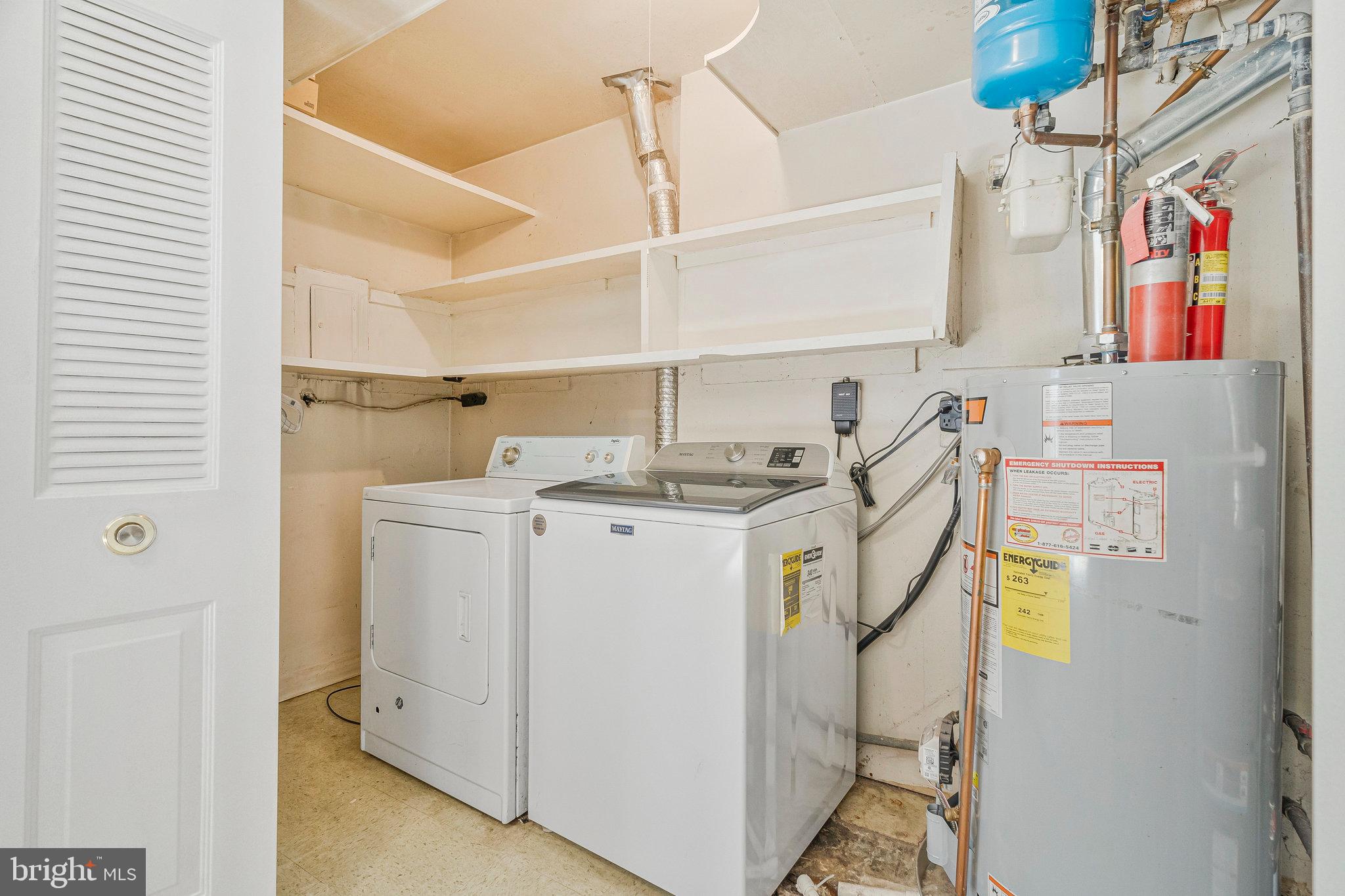 2131 Ferguson Place Herndon, VA 20170 - Photo 24 of 27 a utility room with dryer and washer