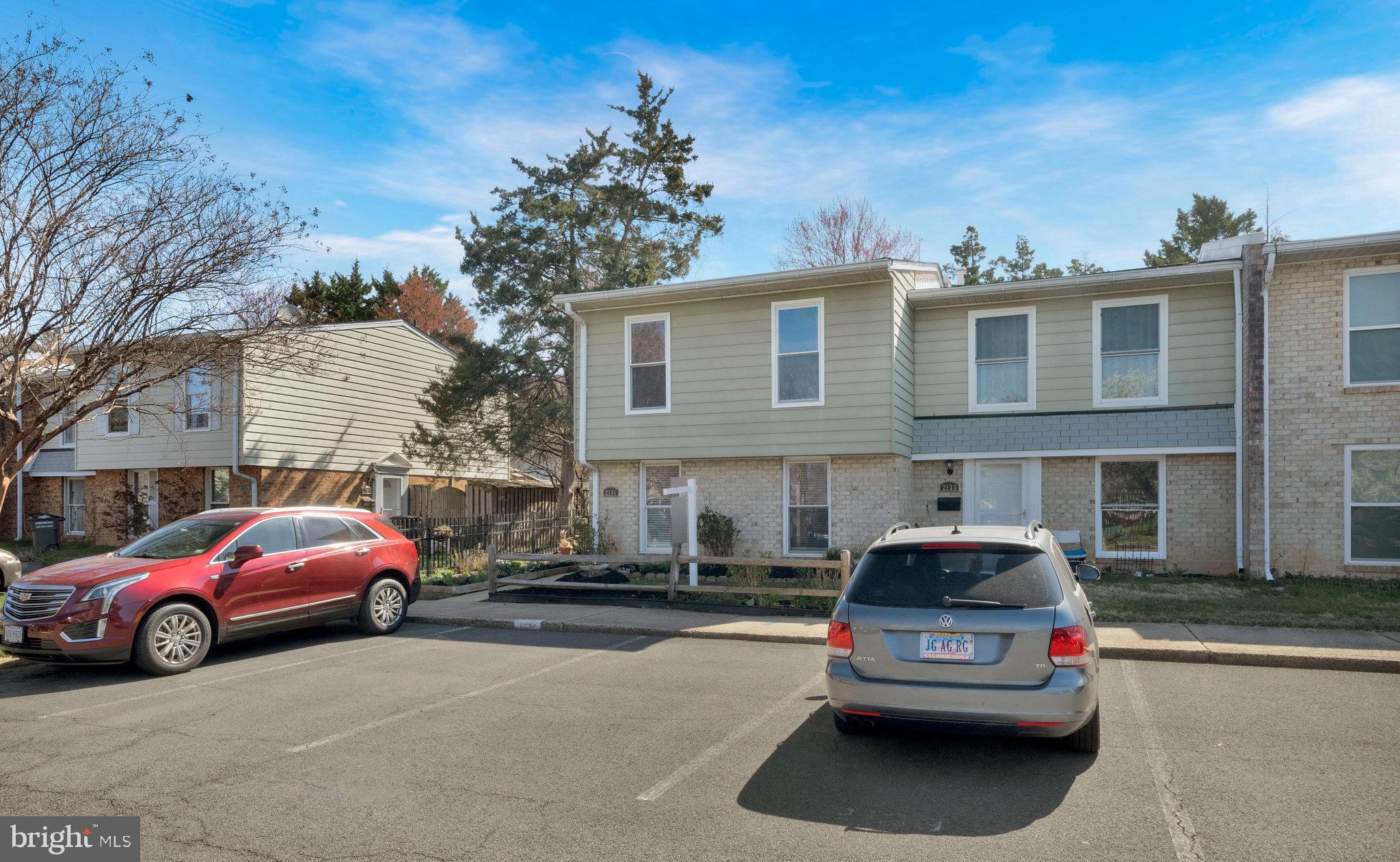 2131 Ferguson Place Herndon, VA 20170 - Photo 3 of 27 a car parked in front of a house