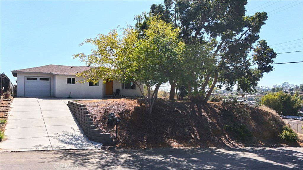 127 East College Street Fallbrook, CA 92028 - Photo 2 of 58 a view of a house with a tree