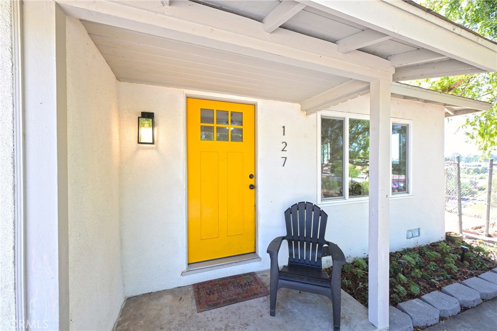 127 East College Street Fallbrook, CA 92028 - Photo 5 of 58 a view of living room and dining area with furniture