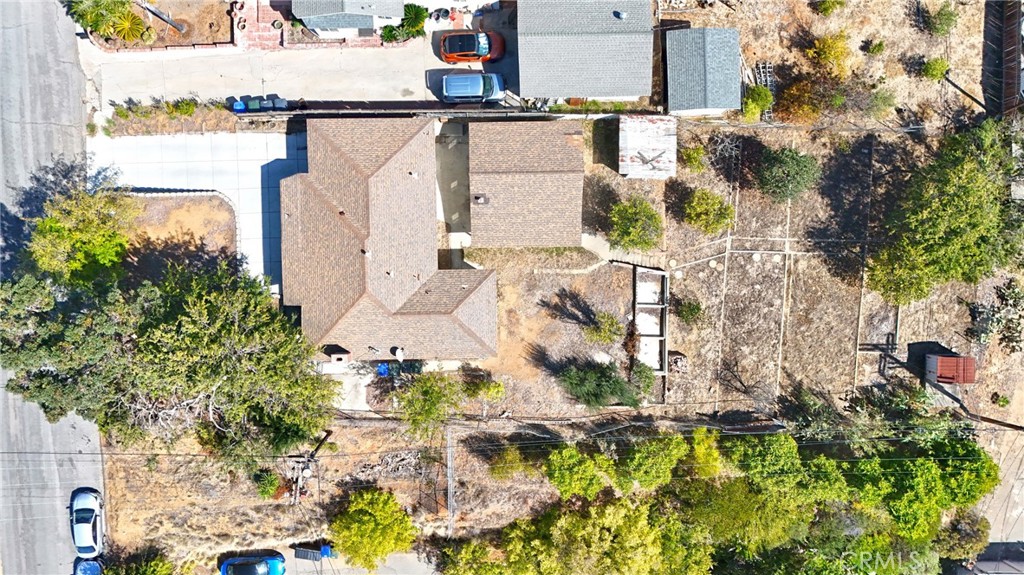 127 East College Street Fallbrook, CA 92028 - Photo 56 of 58 an aerial view of a house with a yard and garden
