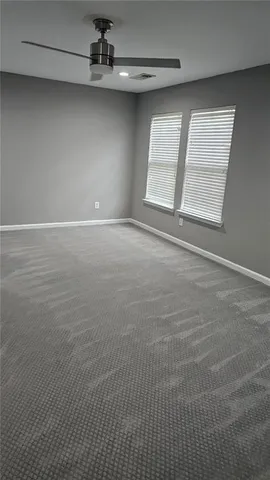 a stove top oven sitting inside of a kitchen