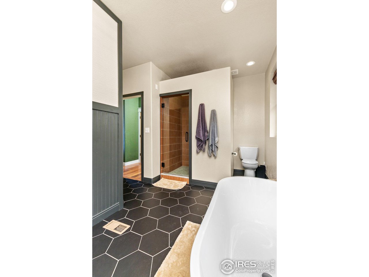 2833 Lump Gulch Road Black Hawk, CO 80422 - Photo 18 of 40 a bathroom with a sink and a mirror