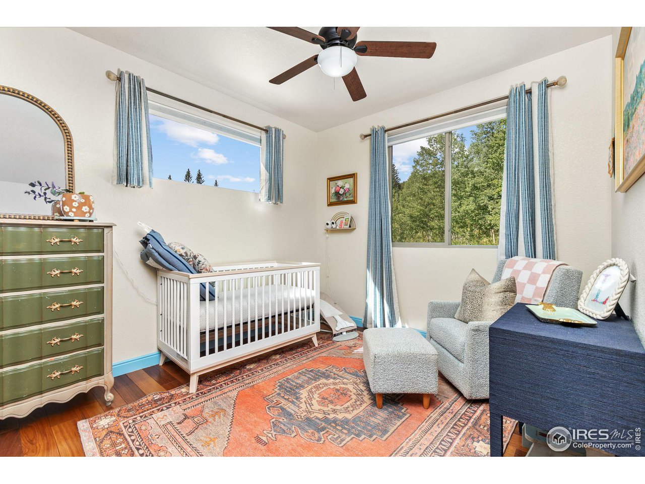 2833 Lump Gulch Road Black Hawk, CO 80422 - Photo 19 of 40 a bedroom with furniture and a window