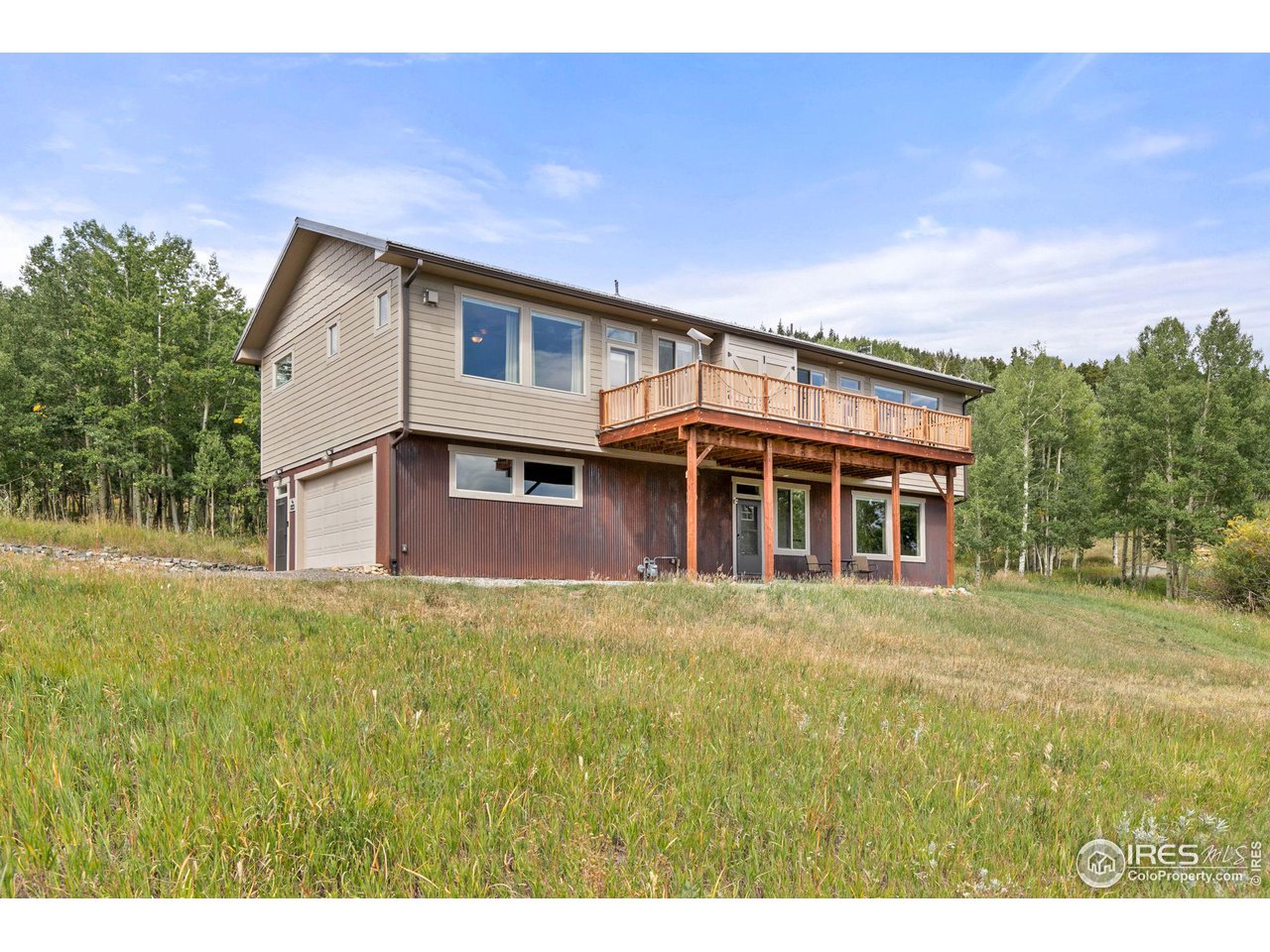 2833 Lump Gulch Road Black Hawk, CO 80422 - Photo 2 of 40 a view of front of house with a yard