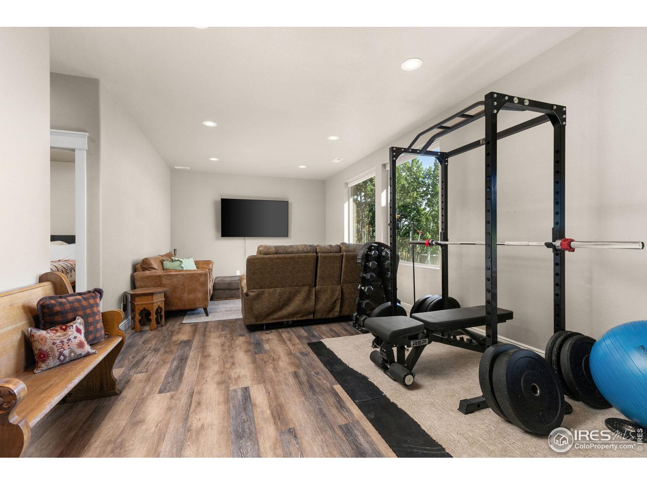 2833 Lump Gulch Road Black Hawk, CO 80422 - Photo 26 of 40 a view of a livingroom with furniture and a flat screen tv