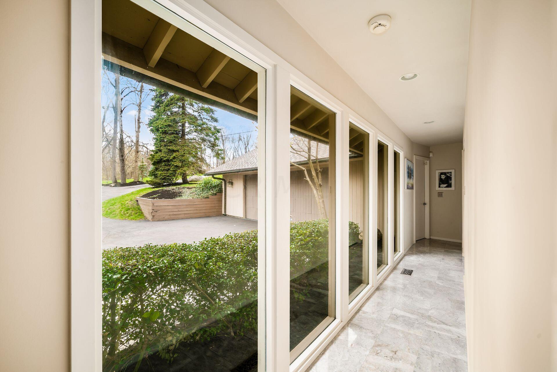 3996 Old Poste Road Columbus, OH 43221 - Photo 47 of 85 Walk way w/ wall of windows