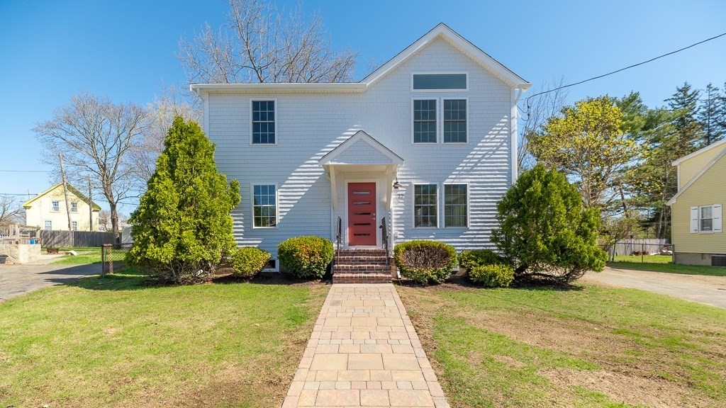 32 Lexington Drive Beverly, MA 01915 - Photo 1 of 41 a front view of a house with a yard
