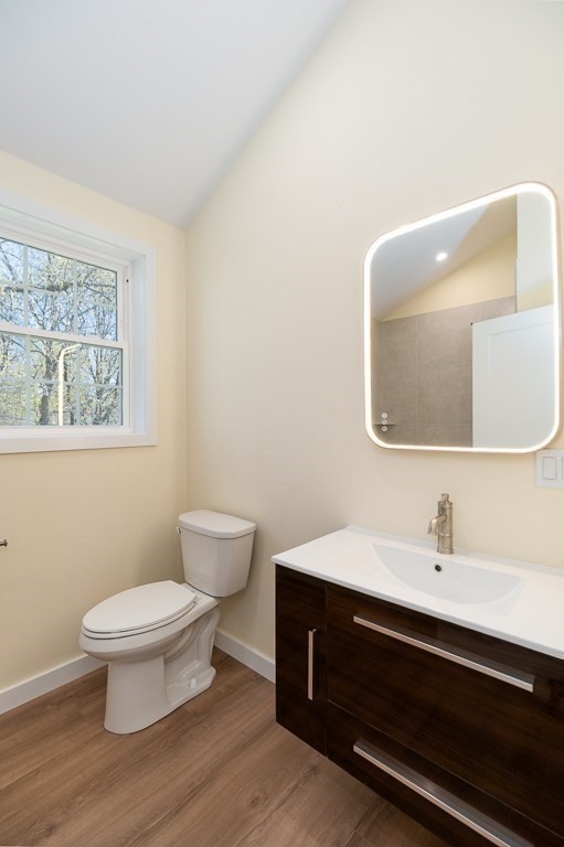 32 Lexington Drive Beverly, MA 01915 - Photo 20 of 41 a bathroom with a toilet a sink and mirror