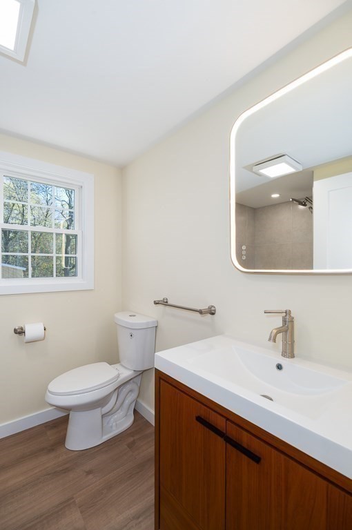 32 Lexington Drive Beverly, MA 01915 - Photo 21 of 41 a bathroom with a sink a toilet and a mirror