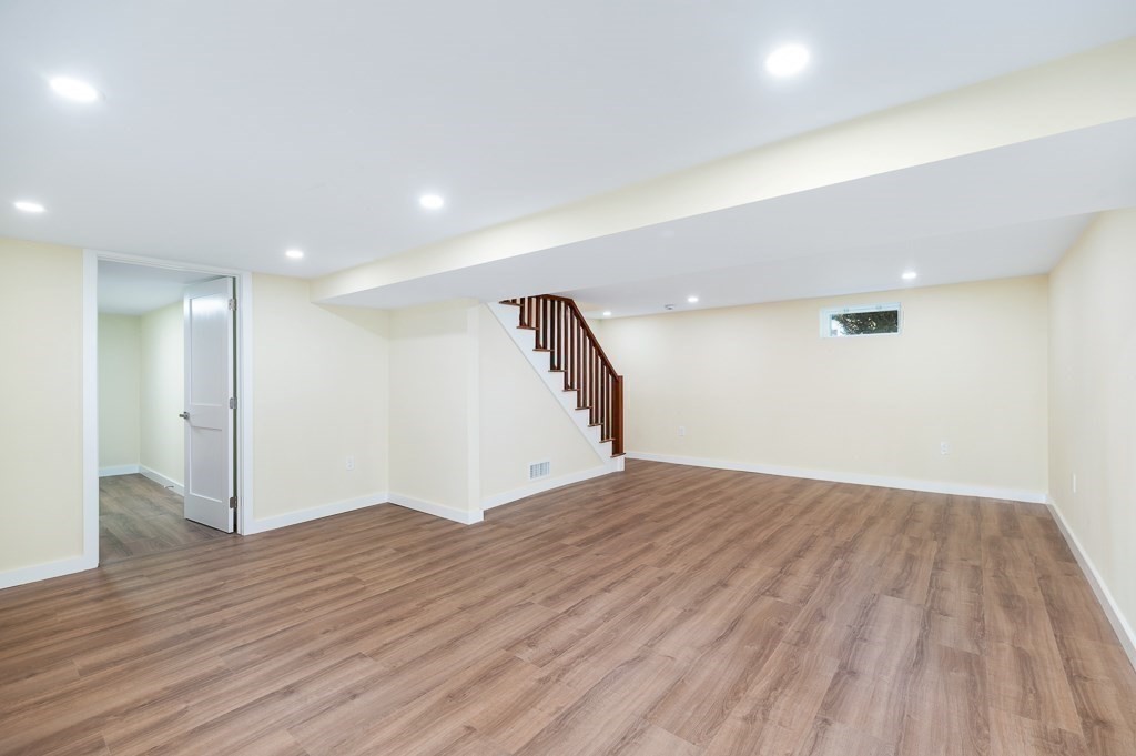 32 Lexington Drive Beverly, MA 01915 - Photo 27 of 41 a view of an empty room with wooden floor