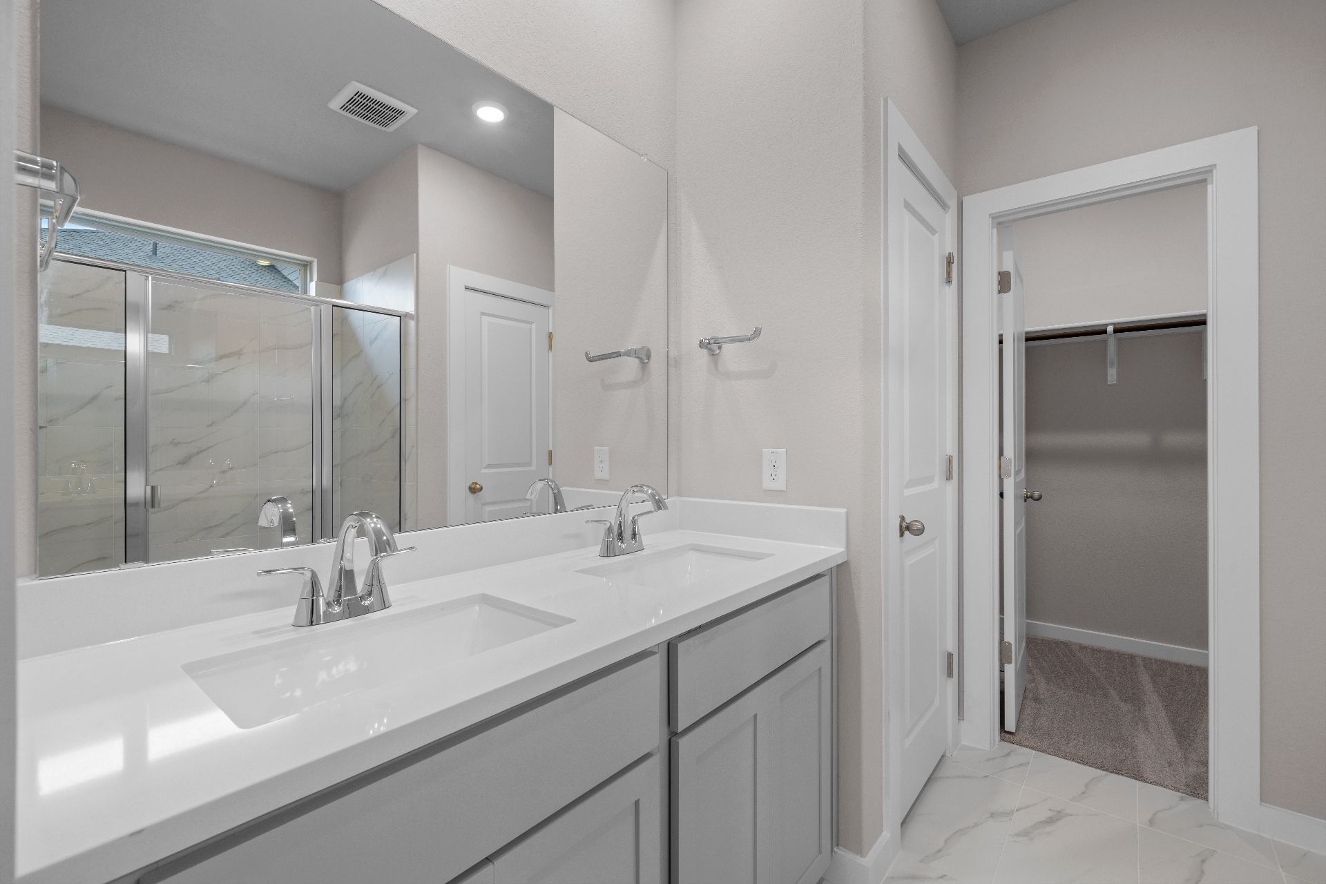 239 Red Tail Hawk Lane Cedar Creek, TX 78612 - Photo 15 of 27 Primary Bath retreat with dual vanities