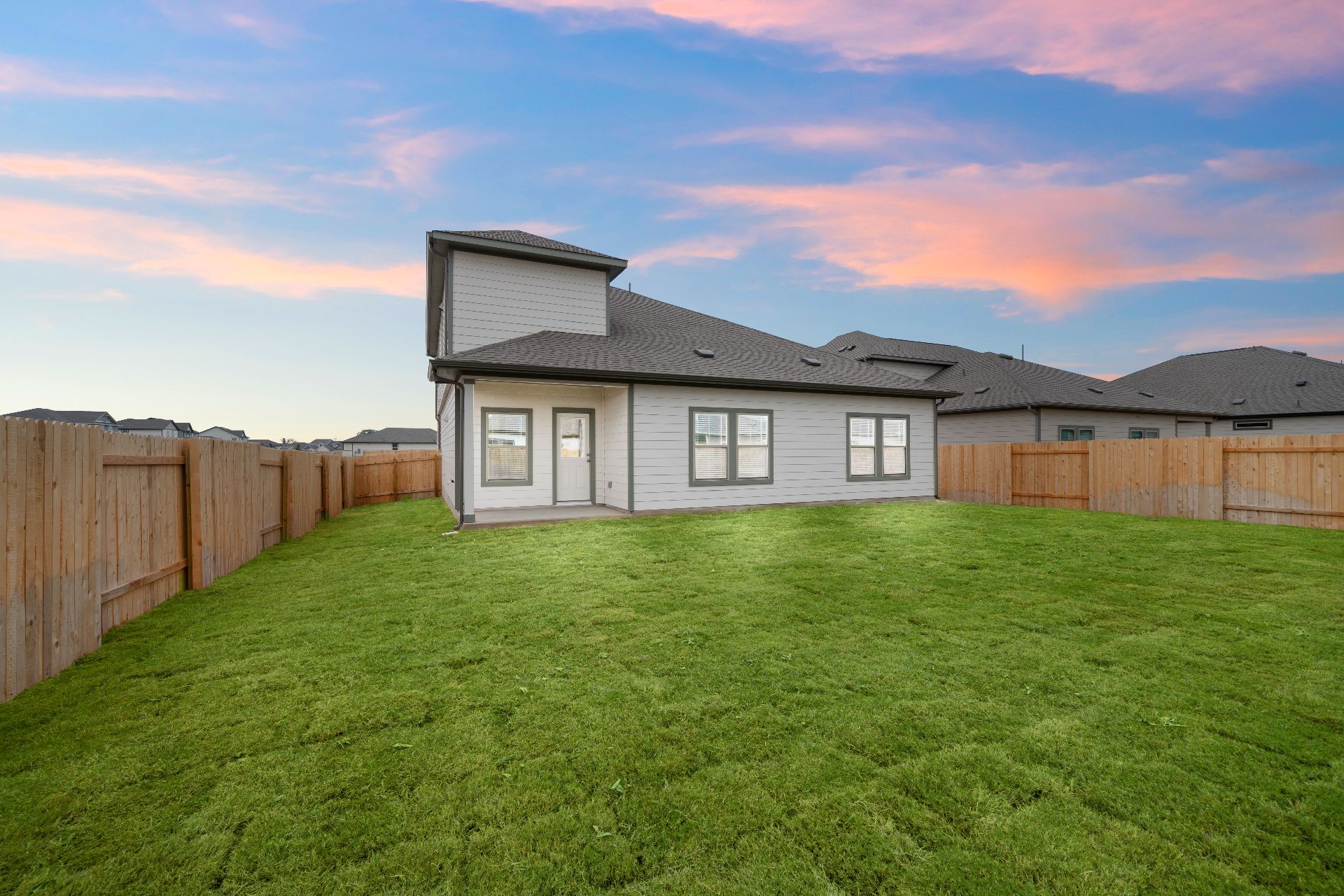 239 Red Tail Hawk Lane Cedar Creek, TX 78612 - Photo 23 of 27 Rear of Home and Private Backyard