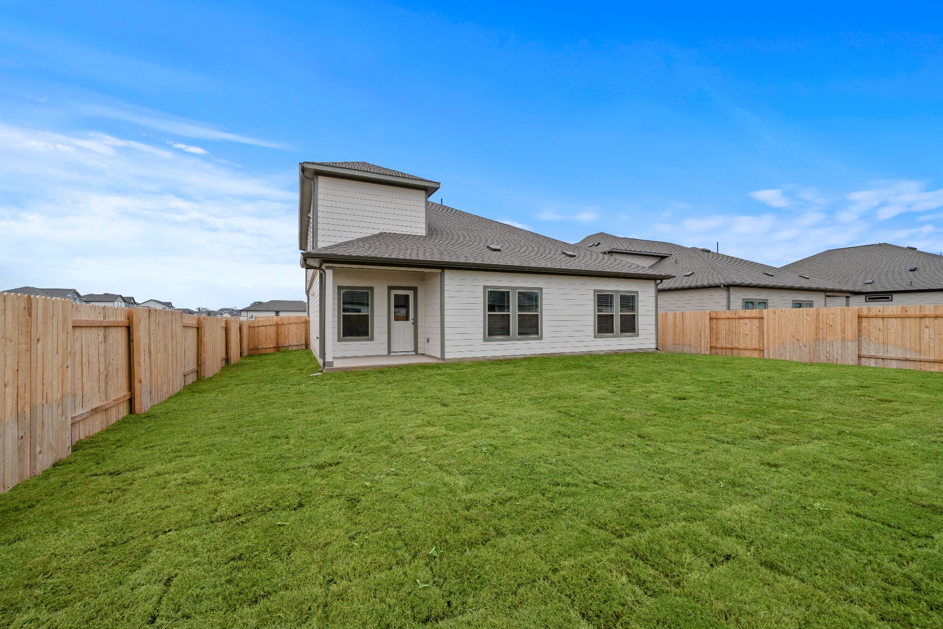 239 Red Tail Hawk Lane Cedar Creek, TX 78612 - Photo 24 of 27 Rear of Home and Private Backyard