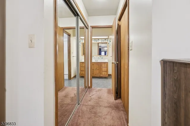a view of a bathroom with a glass door