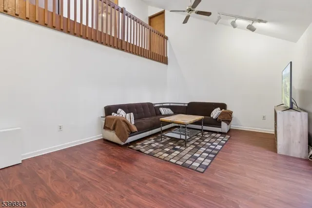 a living room with furniture rug and a rug