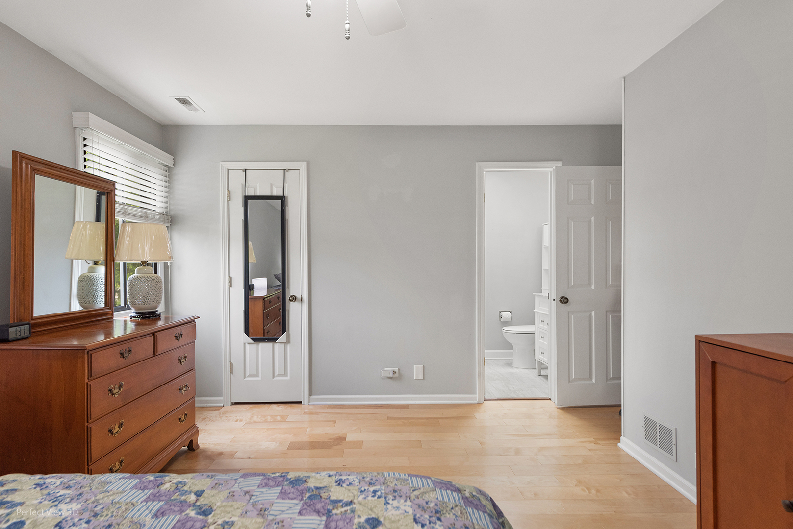 -n120 Windermere Road, Unit 2008 Winfield, IL 60190 - Photo 14 of 23 a view of a bedroom with cabinet and mirror