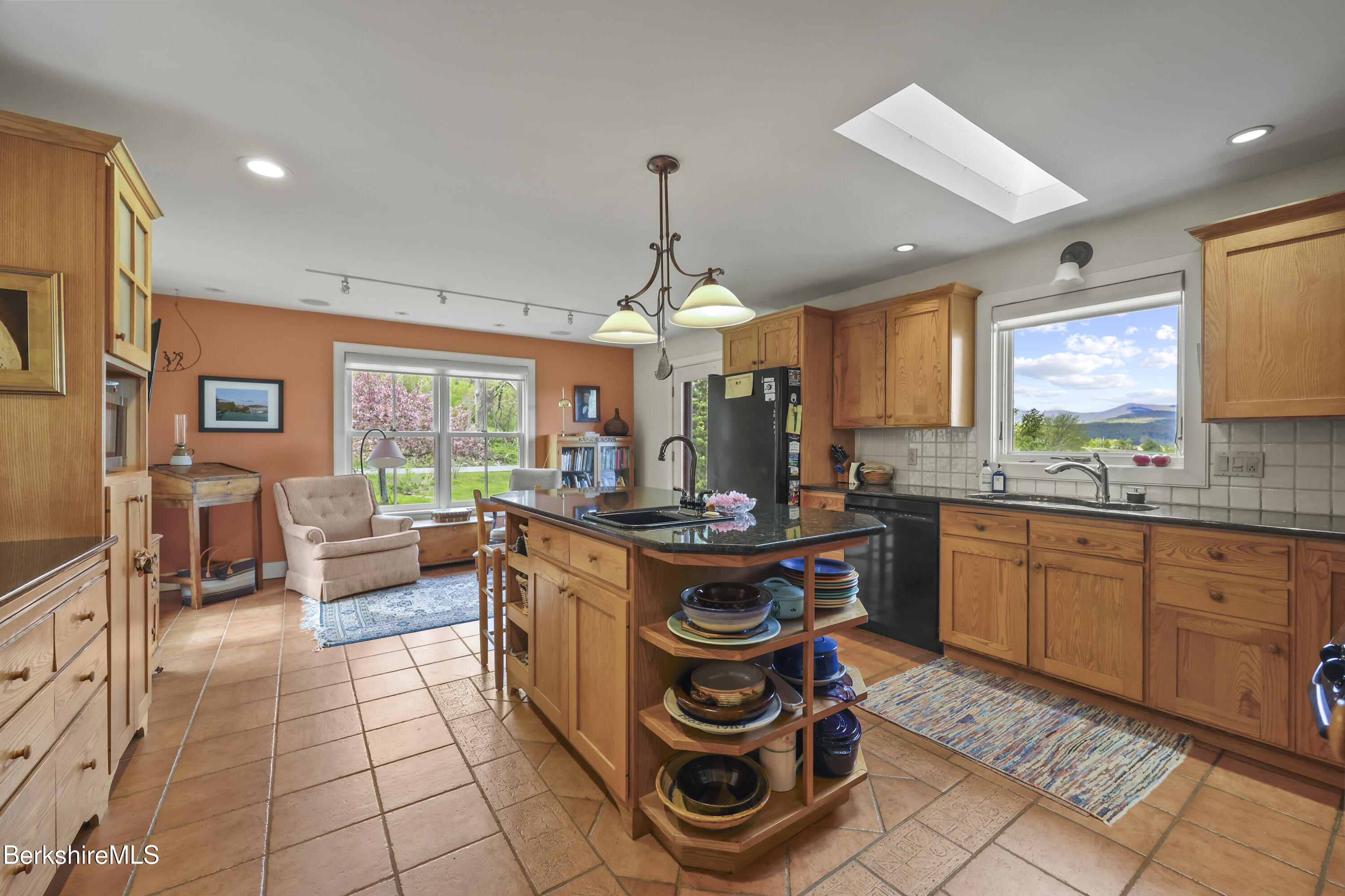 821 Pattison Road North Adams, MA 01247 - Photo 23 of 68 a kitchen with stainless steel appliances granite countertop a stove a sink and a refrigerator
