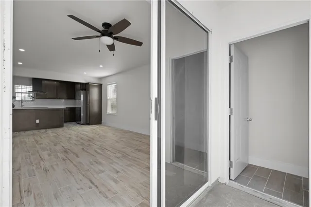 a view of entryway with wooden floor