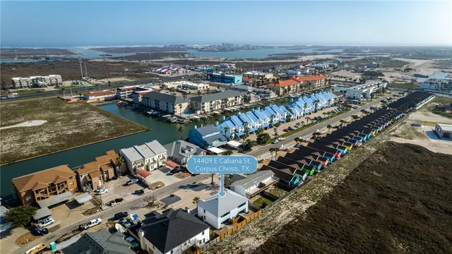 an aerial view of a houses with outdoor space