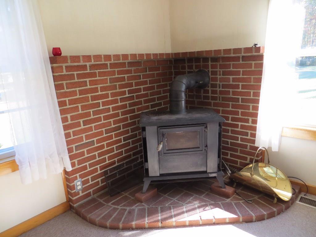 139 Jesse Robbins Road Belfast, ME 04915 - Photo 19 of 25 Wood stove and hearth.