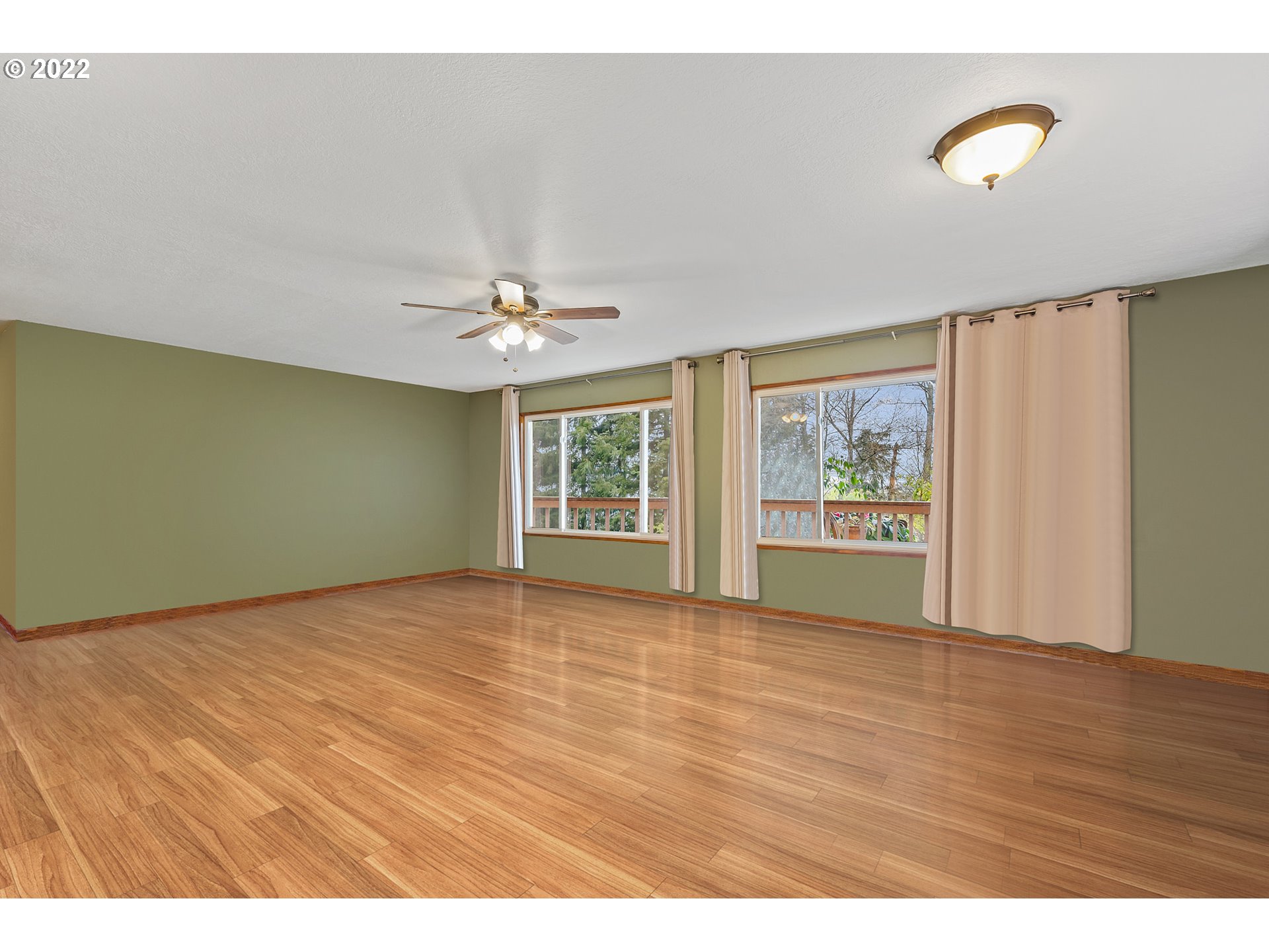 8020 Greentree Ridge Road Tillamook, OR 97141 - Photo 14 of 31 a view of an empty room with window and wooden floor