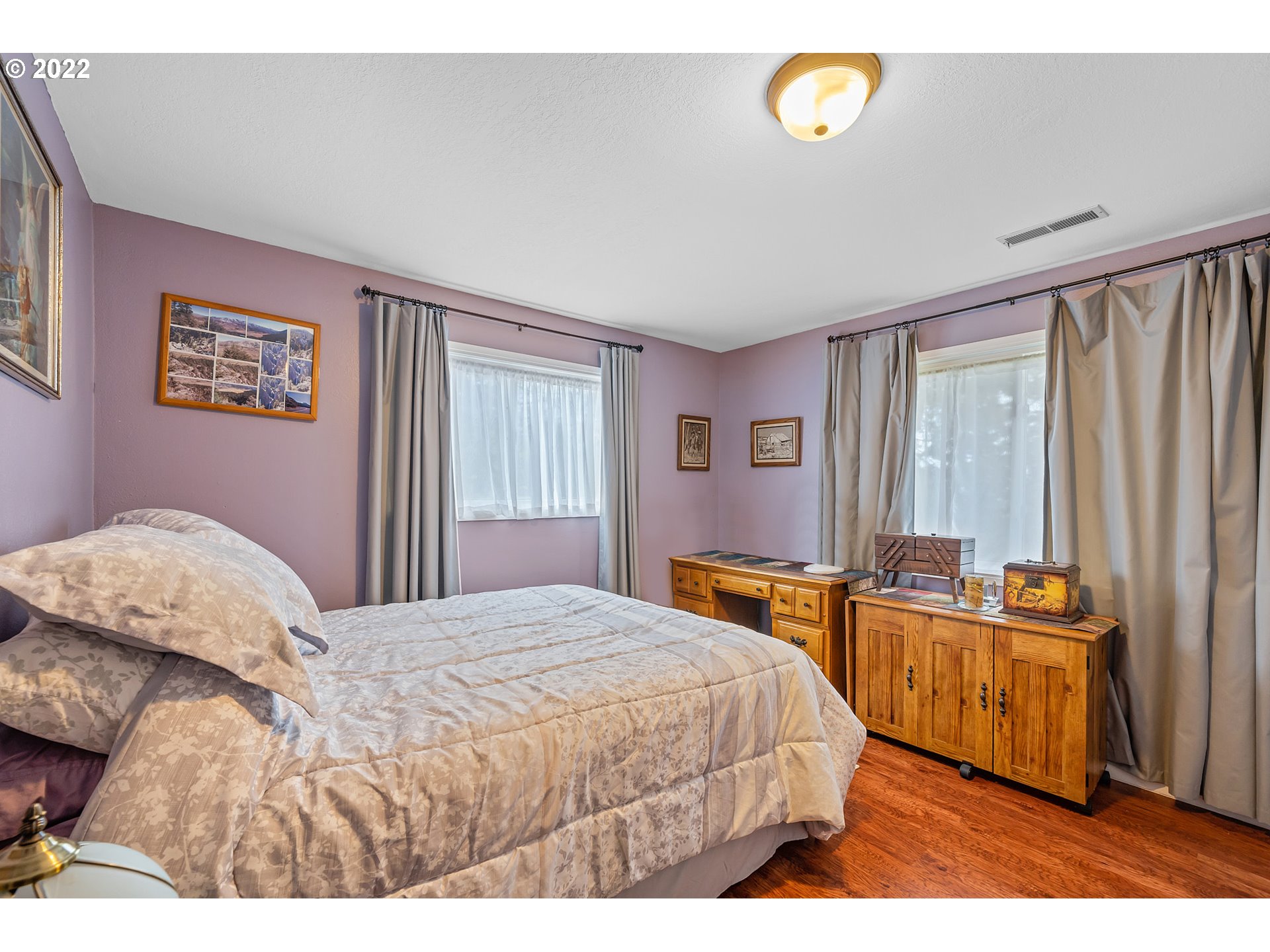 8020 Greentree Ridge Road Tillamook, OR 97141 - Photo 19 of 31 a bedroom with a bed and a window