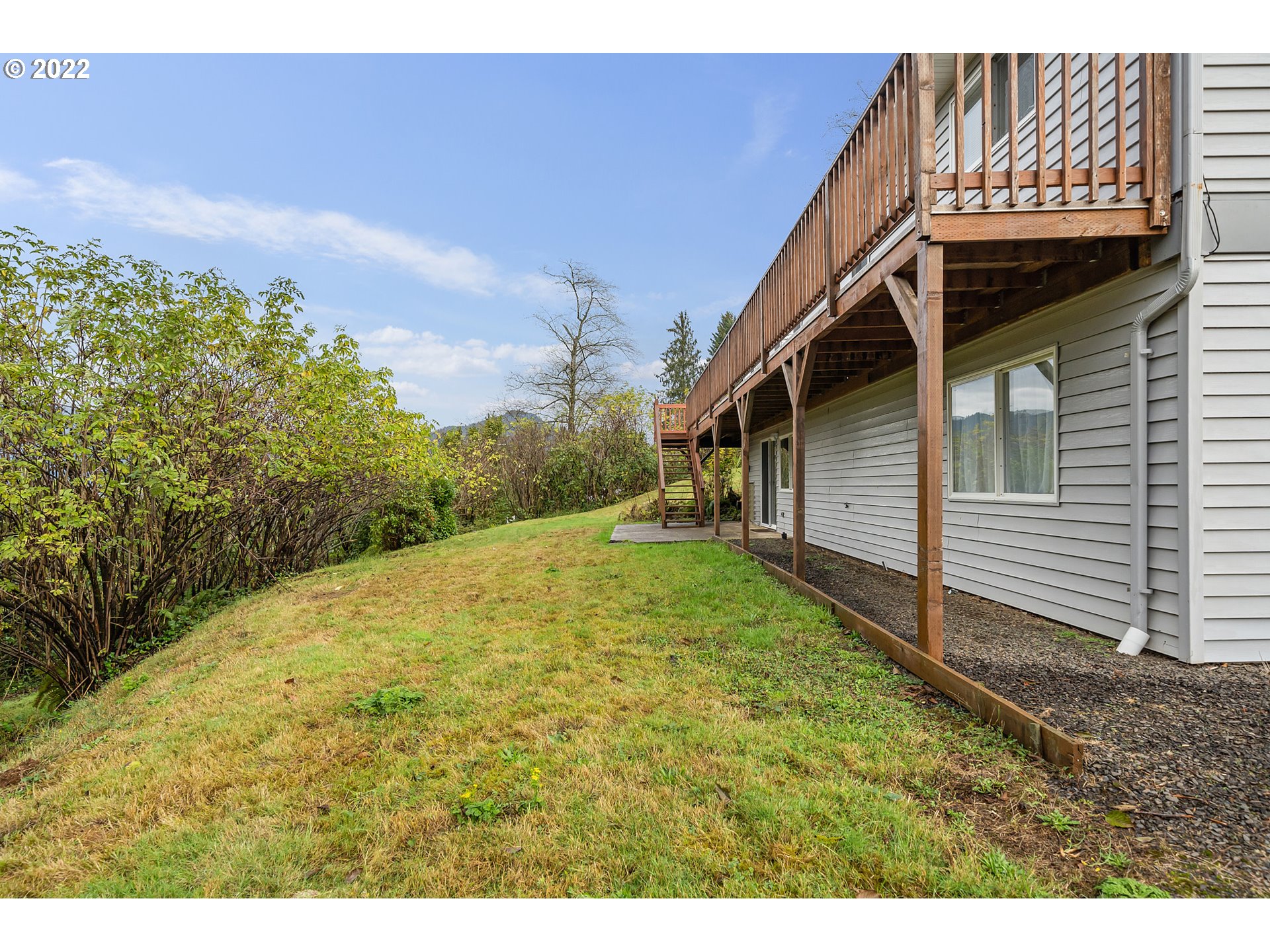 8020 Greentree Ridge Road Tillamook, OR 97141 - Photo 23 of 31 a backyard of a house with lots of green space
